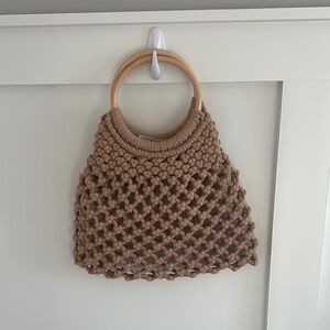 Do Everything in Love Tan Clutch with Woven Design and Circular Handle